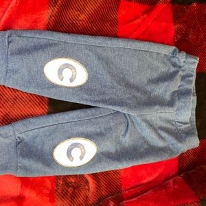 Sesame street 18month toddler blue pants. Not very stretchy fits to size.